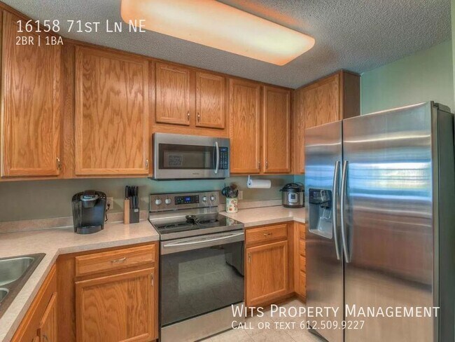 Building Photo - Move-in Special! $400 Credit - Cozy 2 Bed ...