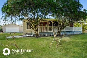 Building Photo - 1219 Thompson Ave