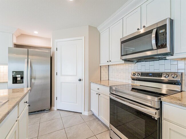 Foto del edificio - 13748 Wineberry Dr