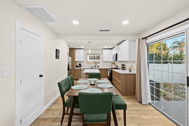 Building Photo - 6449 Woodlake Ave