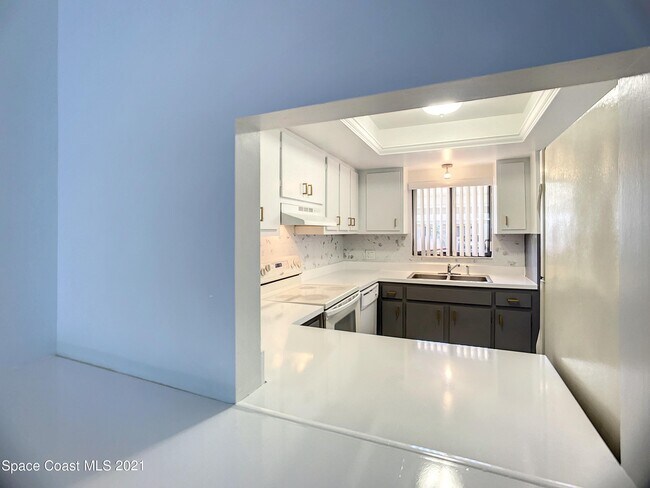 Building Photo - 5800 N Banana River Blvd