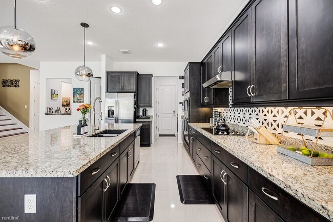Foto del edificio - 4 br, 2.5 bath House - 9044 NW 39th St