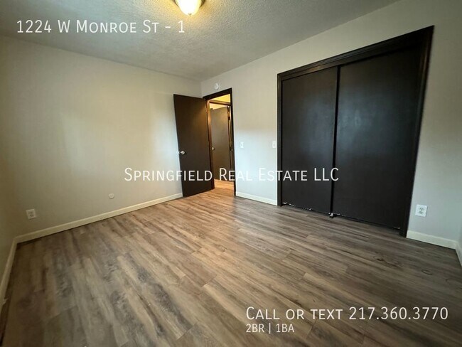 Building Photo - Down-to-Earth Elegance: Charming 2 Bed, 1 ...