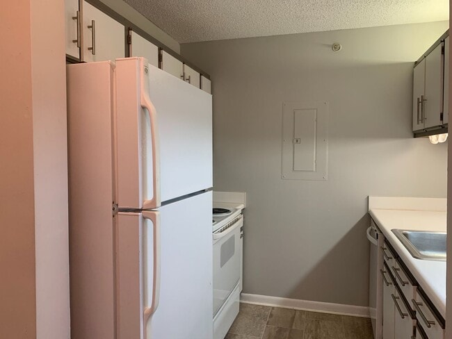Building Photo - UTILITIES INCLUDED! 4 Bedroom | 4 Bath Con...