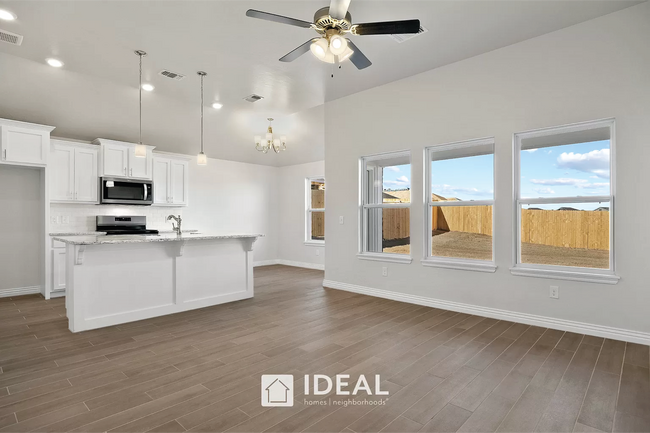 Cocina y sala de estar - 4314 W Country Club Dr