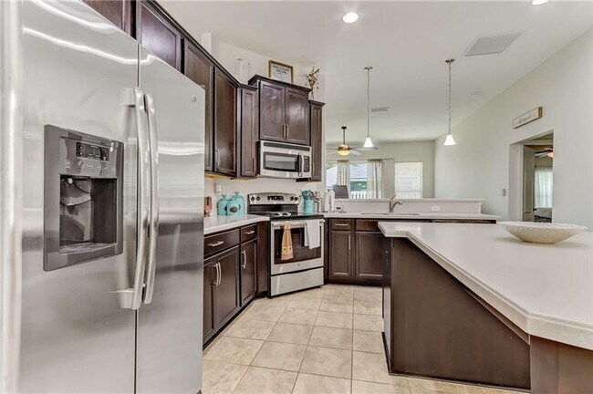 Building Photo - Charming 3-Bedroom Home in The Hideaway – ...