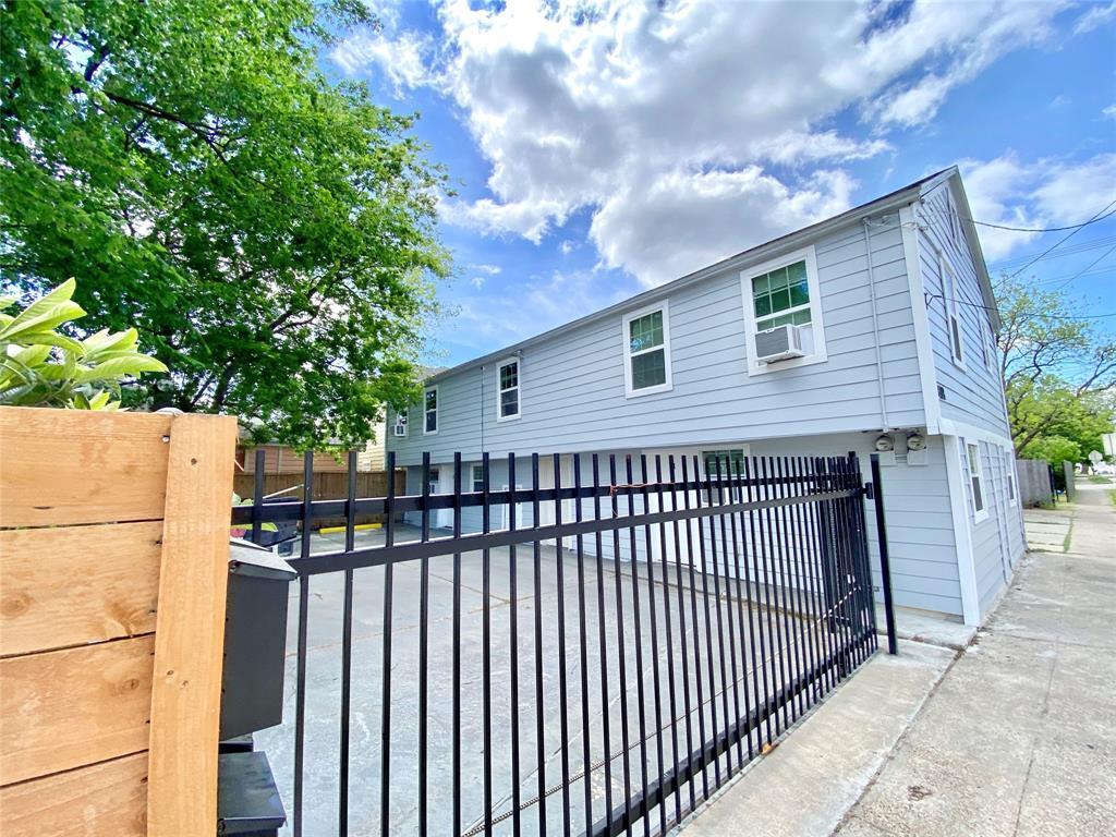 Gated parking with fully enclosed yard - 408 N 67th St