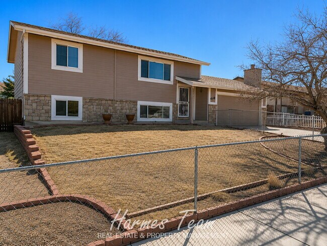 Building Photo - Spacious 4-Bedroom Home with Covered Deck & Large Fenced Yard