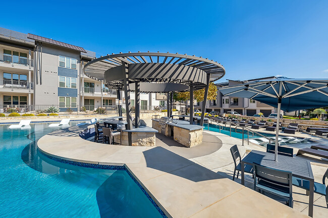 Poolside lounge with ample seating - The Addison Apartments