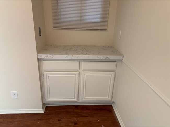 Dining area - New countertop and painted cabinets in Dining area - 6716 Clybourn Ave