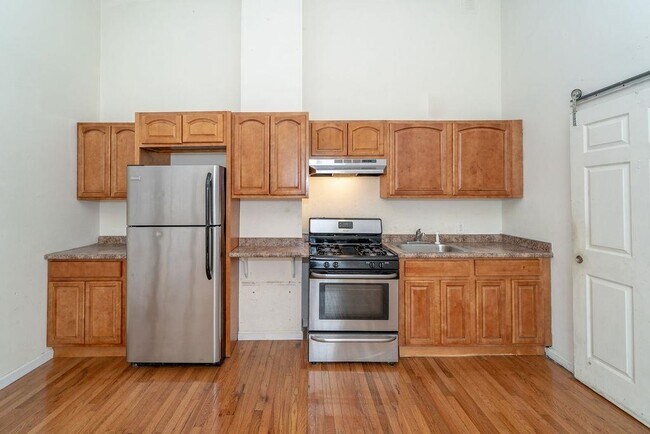 Foto del edificio - 411 John F. Kennedy Blvd