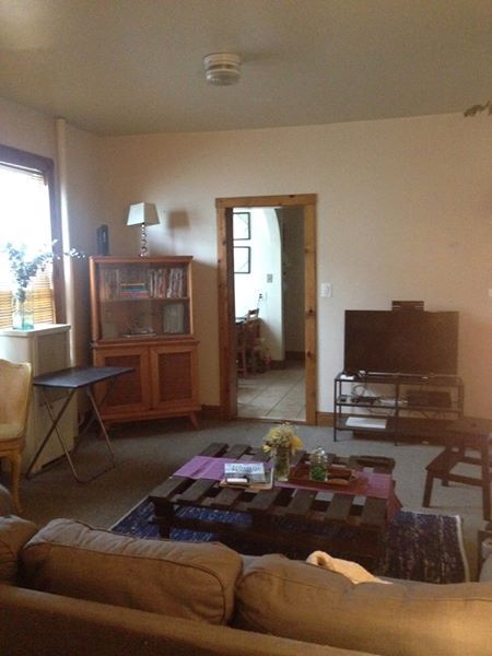 Large living room and office space, ideal for remote work. - 3954 65th Pl