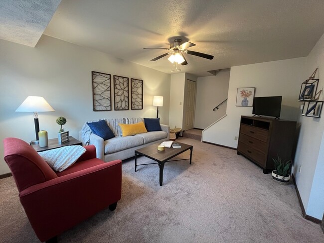 2BD/1B TH Living Room - Holiday Park Apartments and Townhomes