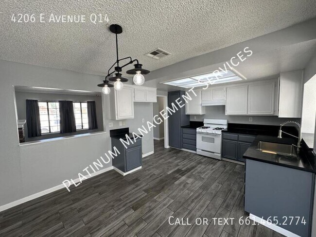 Building Photo - 4206 E Ave Q14