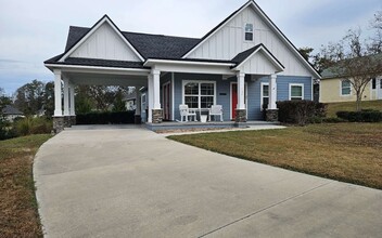 Building Photo - 137 SW Grand Magnolia Gln