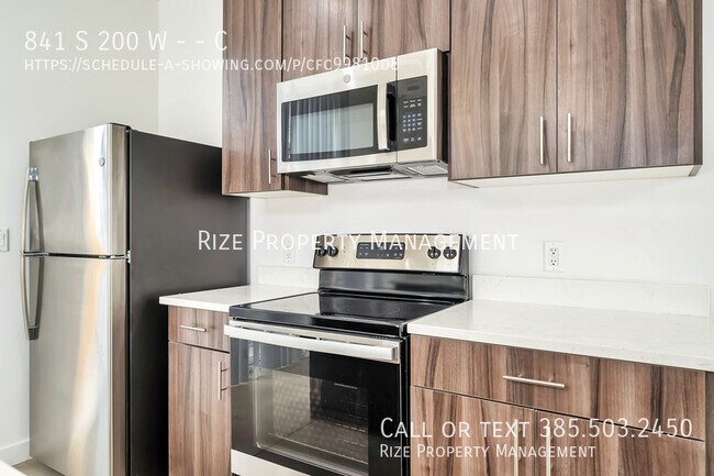 Building Photo - Townhomes Tailored to Your Highest Standards.