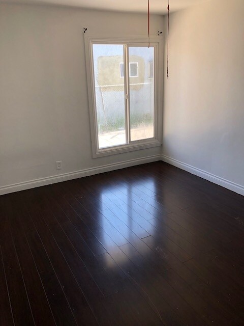 newly remodeled living room with hardwood floors - 1815 S La Brea Ave