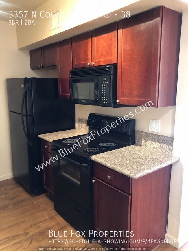 Building Photo - 3357 N Country Club #38