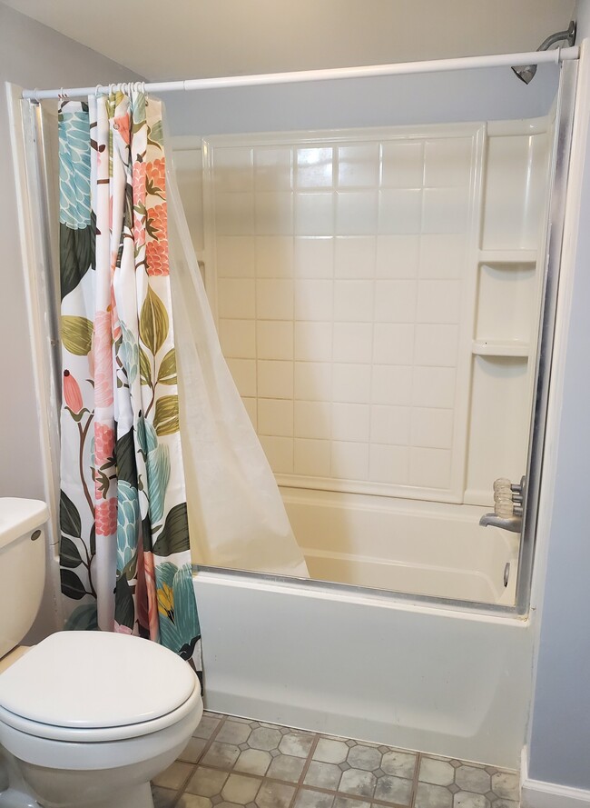 Bathroom with tub - 9829 Liberty Rd