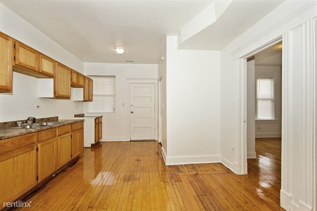 Foto del edificio - 2 br, 1 bath Apartment - 7657 S Morgan St