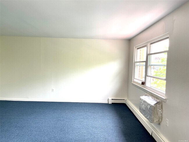 Building Photo - 69-57 Alderton St