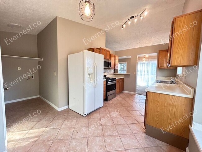 Foto del edificio - 933 River Rock Dr