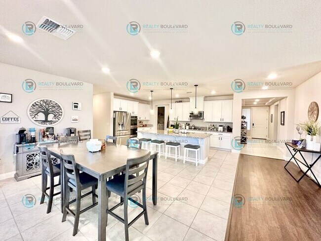 Building Photo - Welcome to your dream home, where modern elegance meets unparalleled convenience!