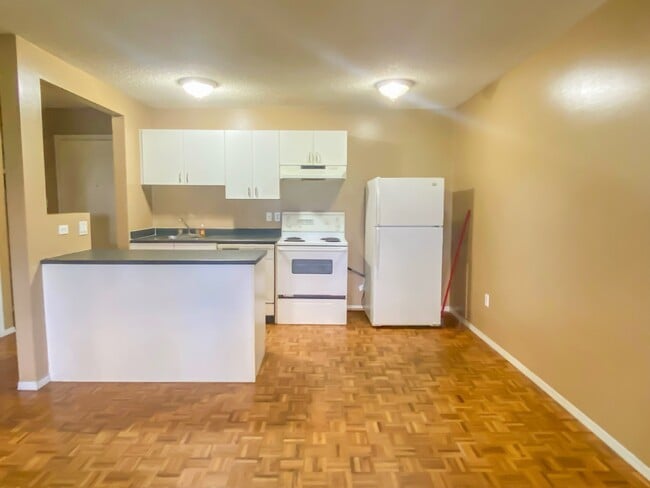 Photo du bâtiment - 1337-1313 13 Ave SW