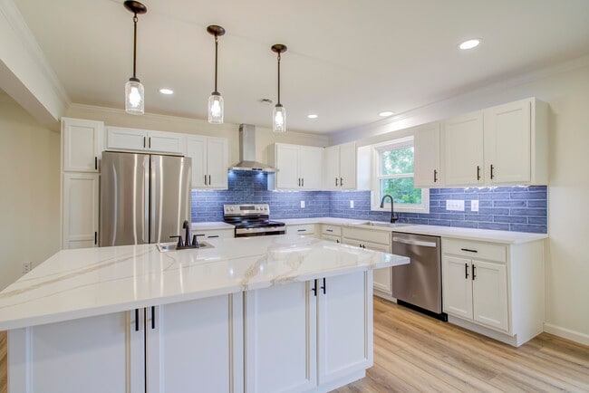New quartz countertops, modern tile backsplash, pendant lighting, new cabinets - 288 Beaver Rd