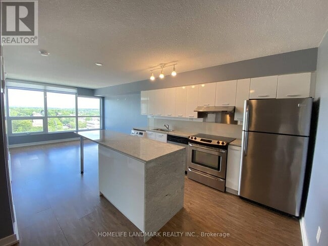 Building Photo - 15-1115 Singer Ct