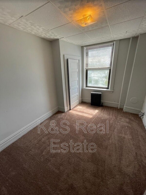 Building Photo - 115 S Birmingham Ave