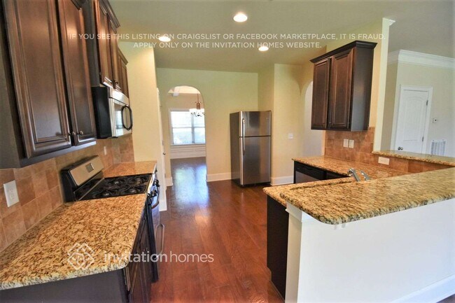 Foto del edificio - 4995 Carriage Bridge Ln