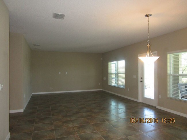 Building Photo - 4/2 Pool Home Ready NOW in Bella Pointe