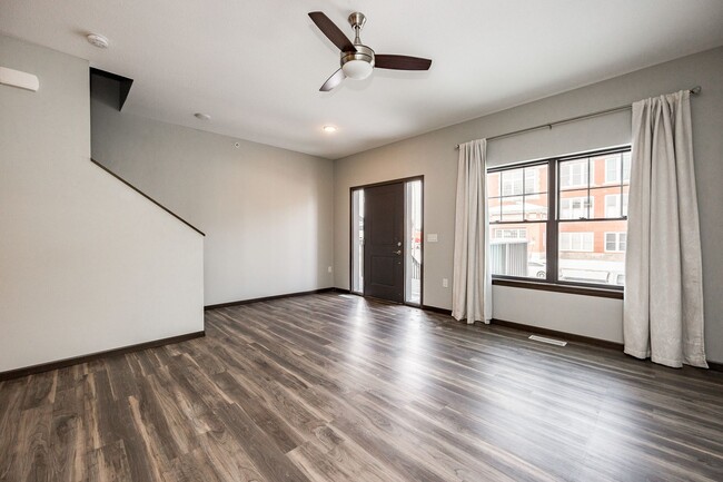 Building Photo - Spacious Townhome with Heated Garage Just ...