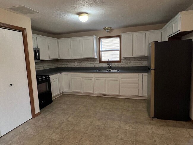 Foto del edificio - 1439 N Texas Ave