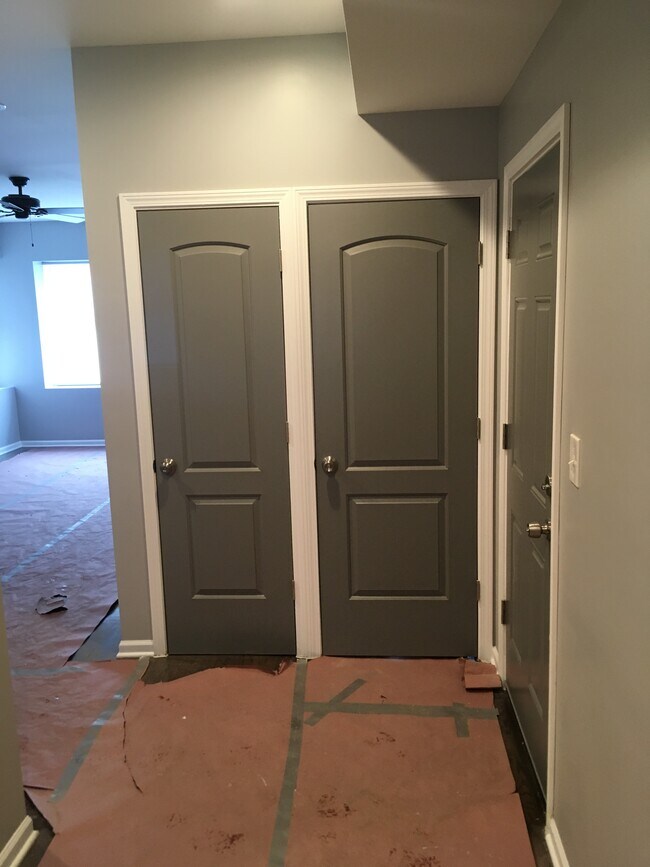 Entryway to apartment showing tri-color paint scheme, facing doorway to Bedroom #1. - 7941 S Rhodes Ave