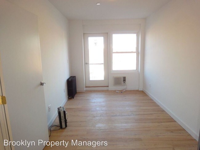 Building Photo - 5215 7th Ave