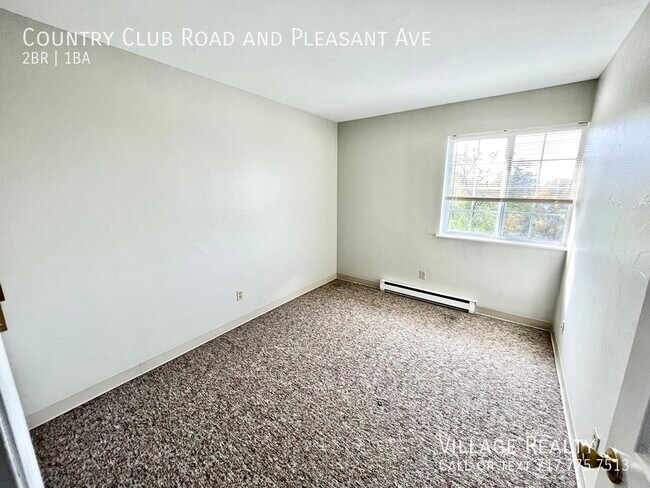 Foto del edificio - Move-in Ready! Roomy end-unit 2-bed w/ on-...