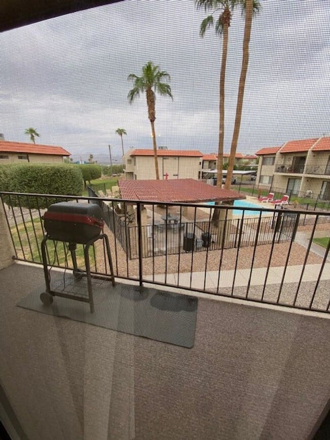 Building Photo - QUAINT, CUTE, 2BR CONDO; Covered Parking; ...