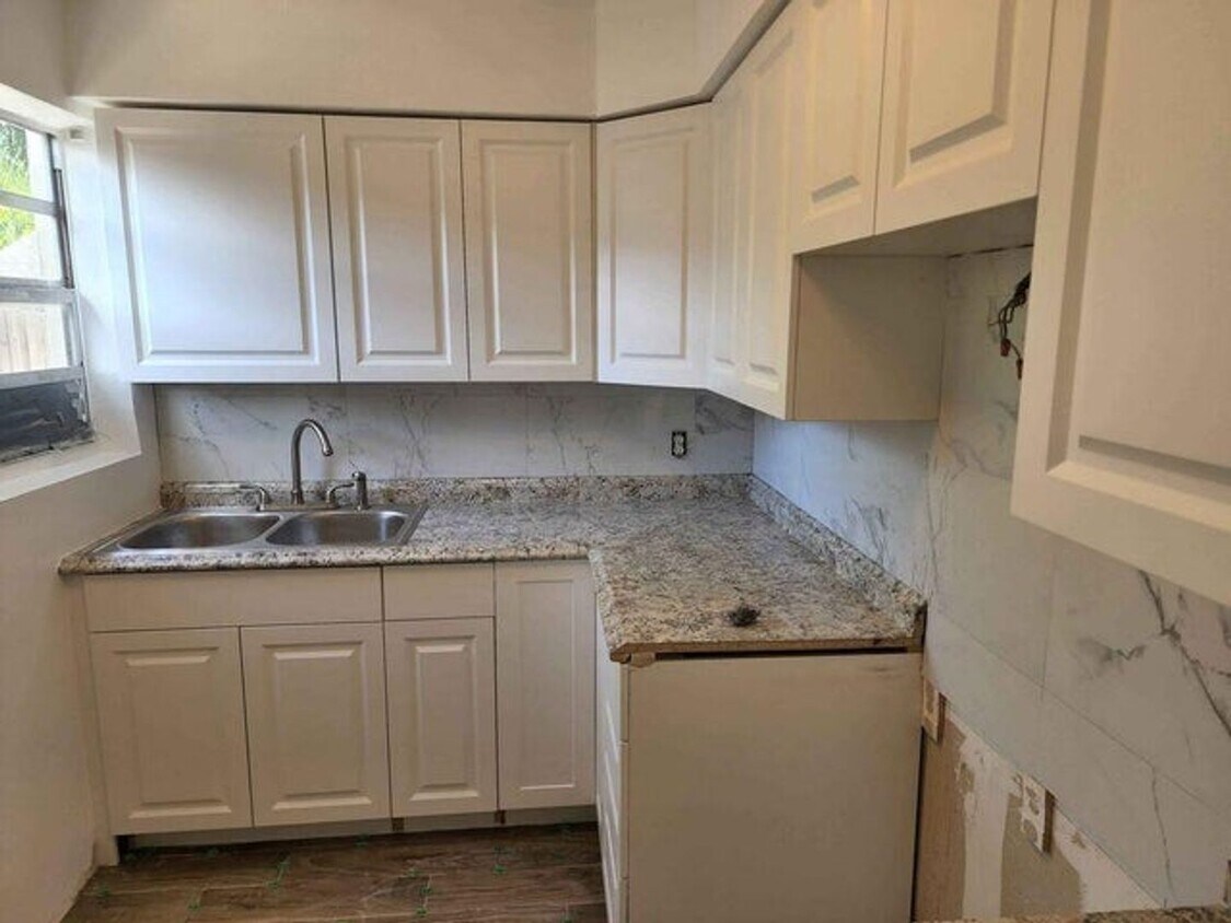 Foto principal - 117 SW 7th Ave