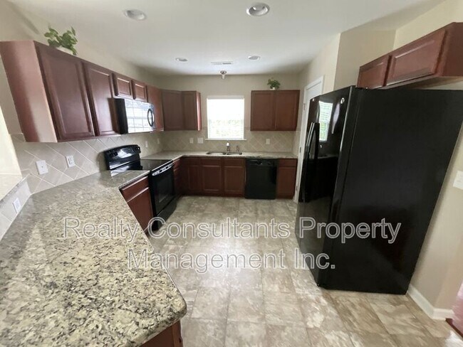 Building Photo - 6143 Trotting Pl
