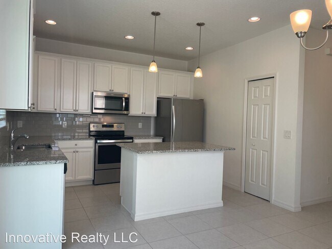 Building Photo - 3 br, 2.5 bath House - 6886 Tussilago Way