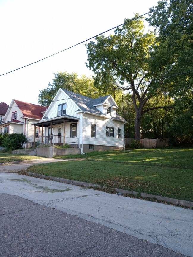 Building Photo - "WE SELL HOUSES ON CONTRACT" PRESENTS 1312...