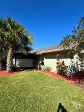 Building Photo - 3993 NW Cinnamon Tree Cir