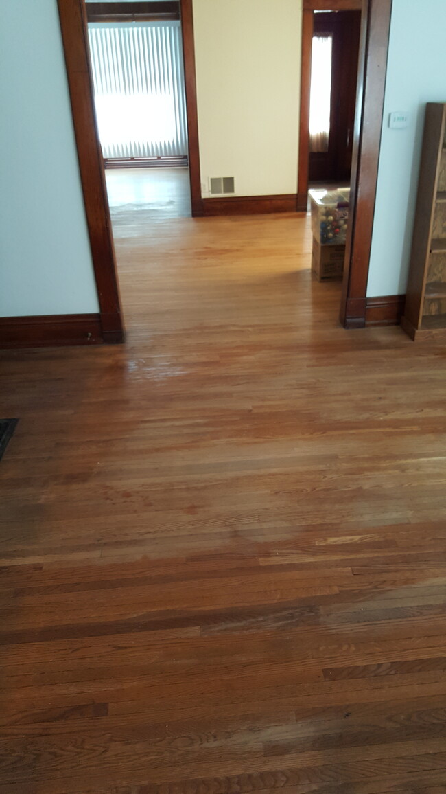 Hardwood floors throughout dining room, living room and den - 820 South Ave