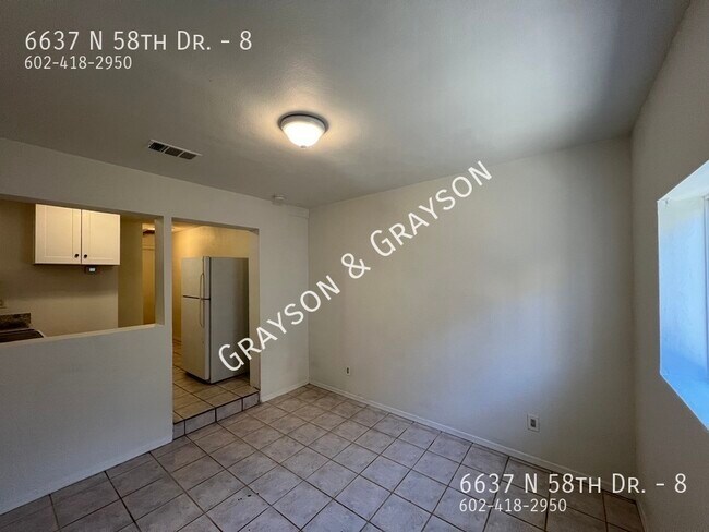 Foto del edificio - 6637 N 58th Dr