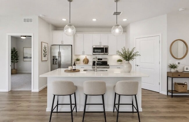 Building Photo - The Villas at Hudson Reserve