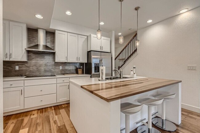 Building Photo - FIRST MONTH OFF - 3BR Townhome in trendy R...