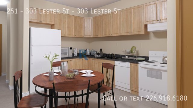 Photo du bâtiment - 303-303 Lester St