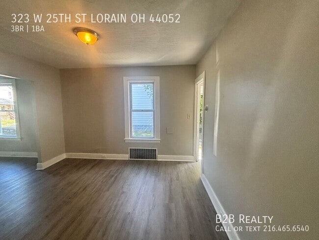 Foto del edificio - 323 W 25th St